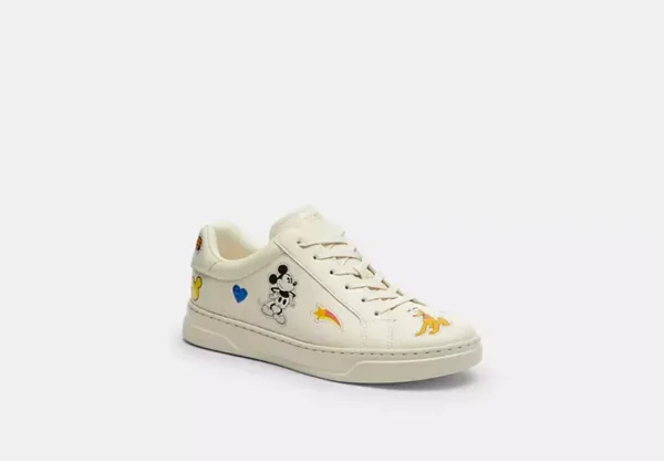 disney x coach high line sneaker with sticker print