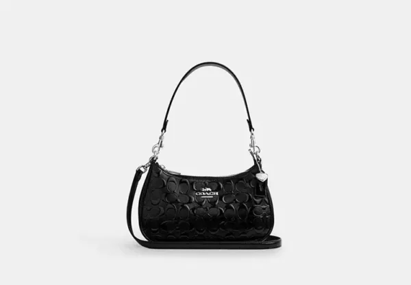 teri shoulder bag in signature leather with heart charm