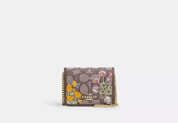 mini wallet on a chain in signature jacquard with floral embroidery